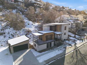 Snowy aerial view with a residential view