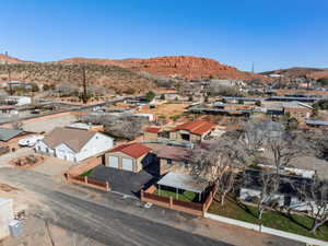 Aerial view of residential area with a mountain backdrop