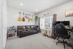 Home office featuring carpet and recessed lighting