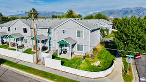 Aerial view of residential area featuring mountains