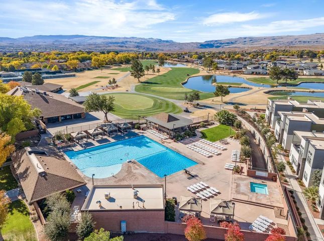 Bird's eye view of a pool and a water and mountain view