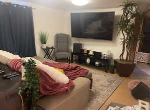 Living room featuring light tile patterned floors