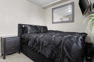 Bedroom featuring carpet