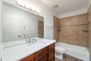 Full bath with shower / bathtub combination and vanity