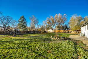 View of fenced backyard