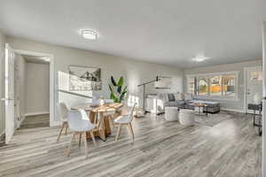 Dining room with light wood-style floors