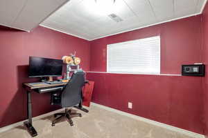 Office space featuring carpet floors and baseboards