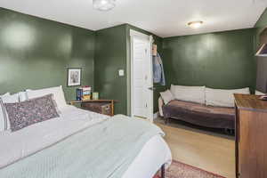 Bedroom featuring wood finished floors