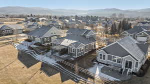 Aerial view of residential area with a mountainous background