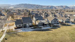 Aerial view of residential area with a mountainous background