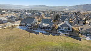 Aerial view of residential area with a mountainous background