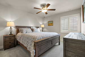 Bedroom with carpet and a ceiling fan