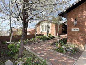View of side of home with brick siding