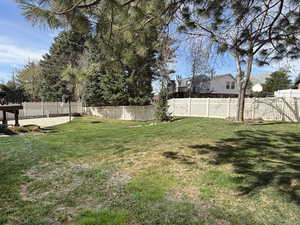 Fenced backyard featuring a patio area