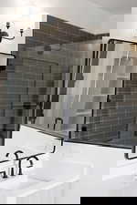 Bathroom featuring vanity and walk in shower