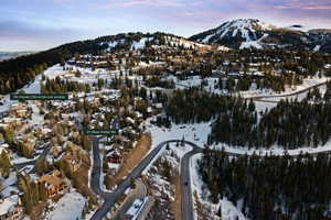 Snowy aerial view with a mountain view