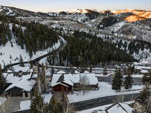 Snowy aerial view featuring a mountain view