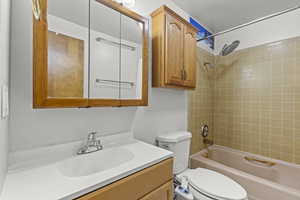 Full bath featuring vanity and tub / shower combination