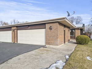 View of front of property with brick siding
