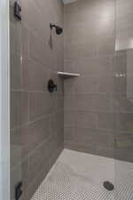 Bathroom with tiled shower