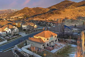 Aerial view at dusk of a mountain view and a residential view