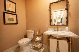 Bathroom with a sink and tile patterned floors