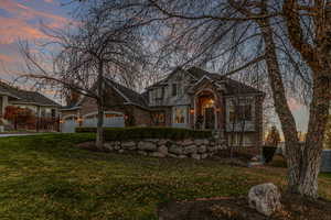 Home sits back off the street with mature trees and large front yard.