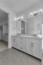 PRIMARY SUITE BATHROOM - WHITE CABINETS W/ WHITE QUARTZ COUNTERTOPS & DOUBLE SINKS!