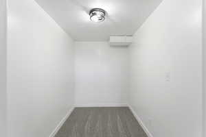 Spare room featuring carpet floors and a textured ceiling