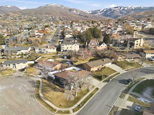 Aerial view of residential area featuring mountains