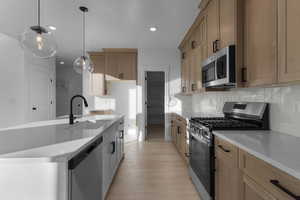 UPGRADED KITCHEN W/ 2 TONE CABINETS & PENDANT LIGHTS!