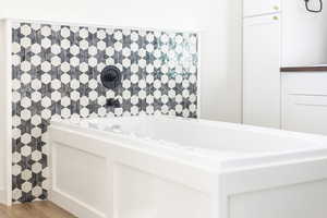 Full bath with a tub