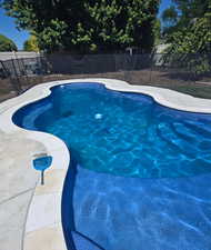 View of pool featuring a fenced backyard