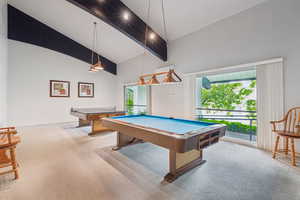 Recreation room featuring billiards, high vaulted ceiling, and beam ceiling