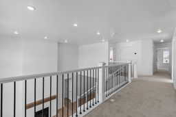 VIEW FROM LOFT AREA ON 2ND FLOOR! (PICTURE OF PREVIOUS BUILT HOME-COLORS AND MATERIALS MAY VARY)