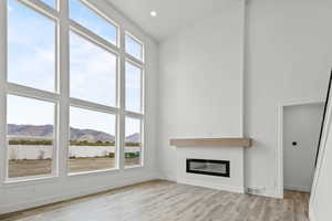 2 STORY WALL OF WINDOWS & FIREPLACE!(PICTURE OF PREVIOUS BUILT HOME-COLORS AND MATERIALS MAY VARY)