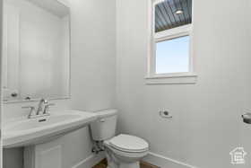 1/2 BATH CLOSE TO GARAGE! (PICTURE OF PREVIOUS BUILT HOME-COLORS AND MATERIALS MAY VARY)