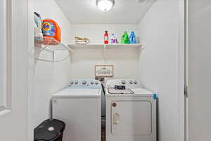 Laundry room with separate washer and dryer