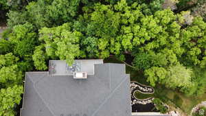 Drone / aerial view of a tree filled landscape