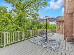 Wooden terrace with outdoor dining space
