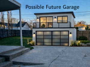 Contemporary home featuring a garage and driveway