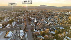 View of property location with nearby suburban area and mountains