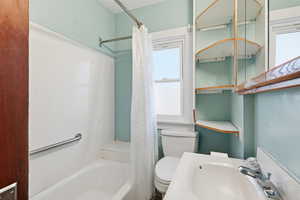 Full bath with shower / tub combo and vanity