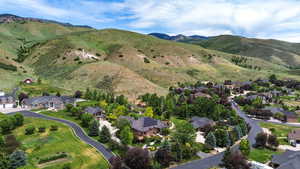 Aerial view of residential area featuring mountains