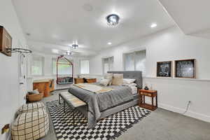 Bedroom featuring light colored carpet and recessed lighting