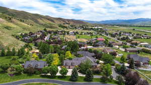Aerial perspective of suburban area featuring mountains