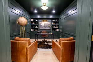 Office featuring built in shelves