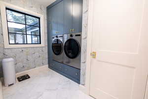 Laundry room in the primary bedroom