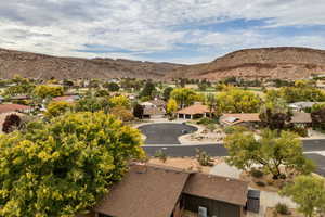 Mountain view featuring nearby suburban area