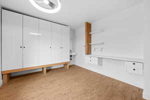 Interior space featuring light wood-type flooring and baseboards